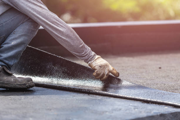 Professional Waterproofing technician working in Whitehall, WI